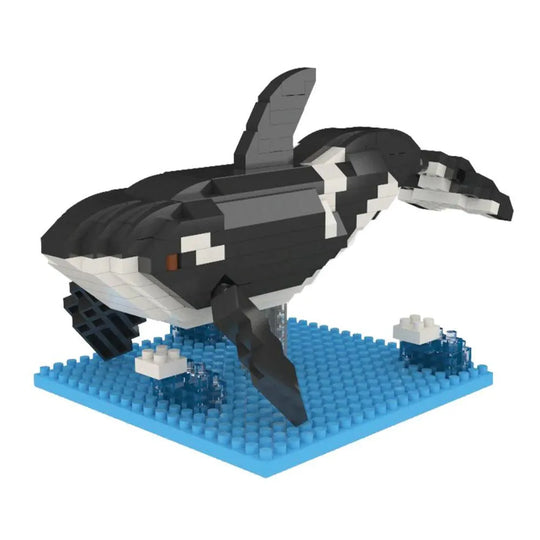 Black and white orca whale mini block building set against a white background.