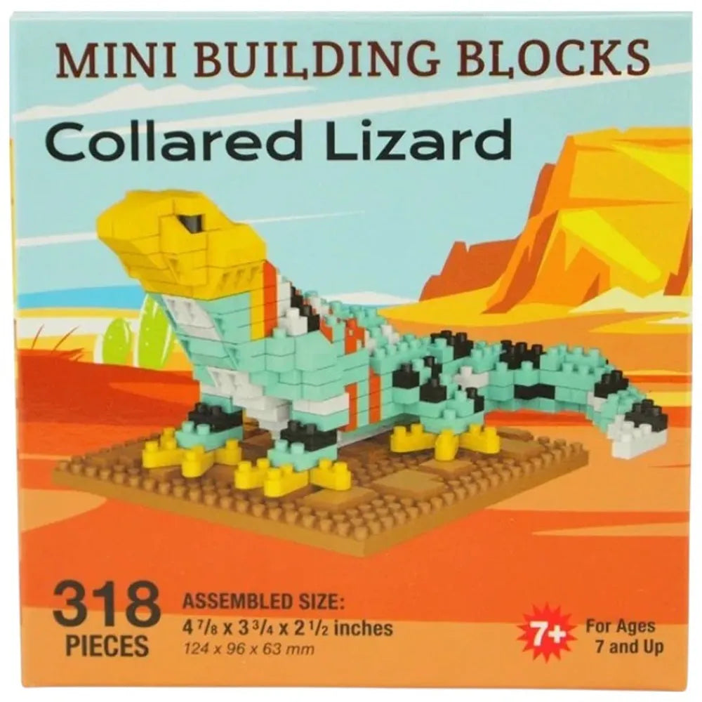 Box of mini building blocks shaped like a collared lizard with desert landscape background