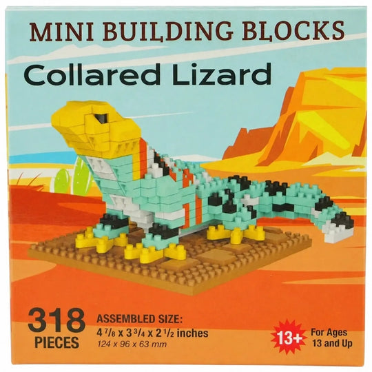 Front of a Mini Building Blocks toy box for the Collared Lizard, showing a assembled lizard made of light blue, yellow, black, and white blocks on a brown base, with desert landscape artwork and text including &