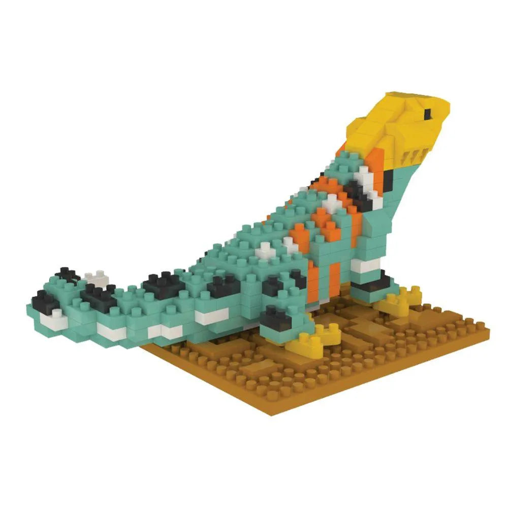 Mini block set of a collared lizard against a white background