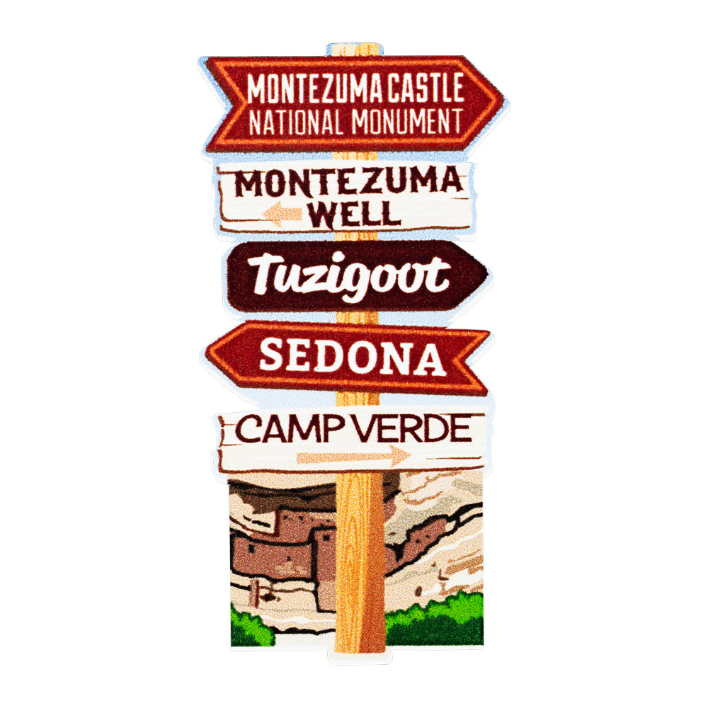 Decorative sticker with directional arrows to Montezuma Castle National Monument and other locations on a white background.