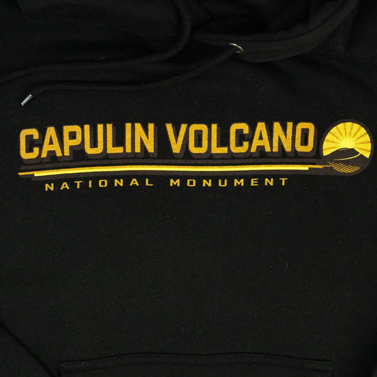 Black hoodie with yellow 'Capulin Volcano National Monument' text and logo.