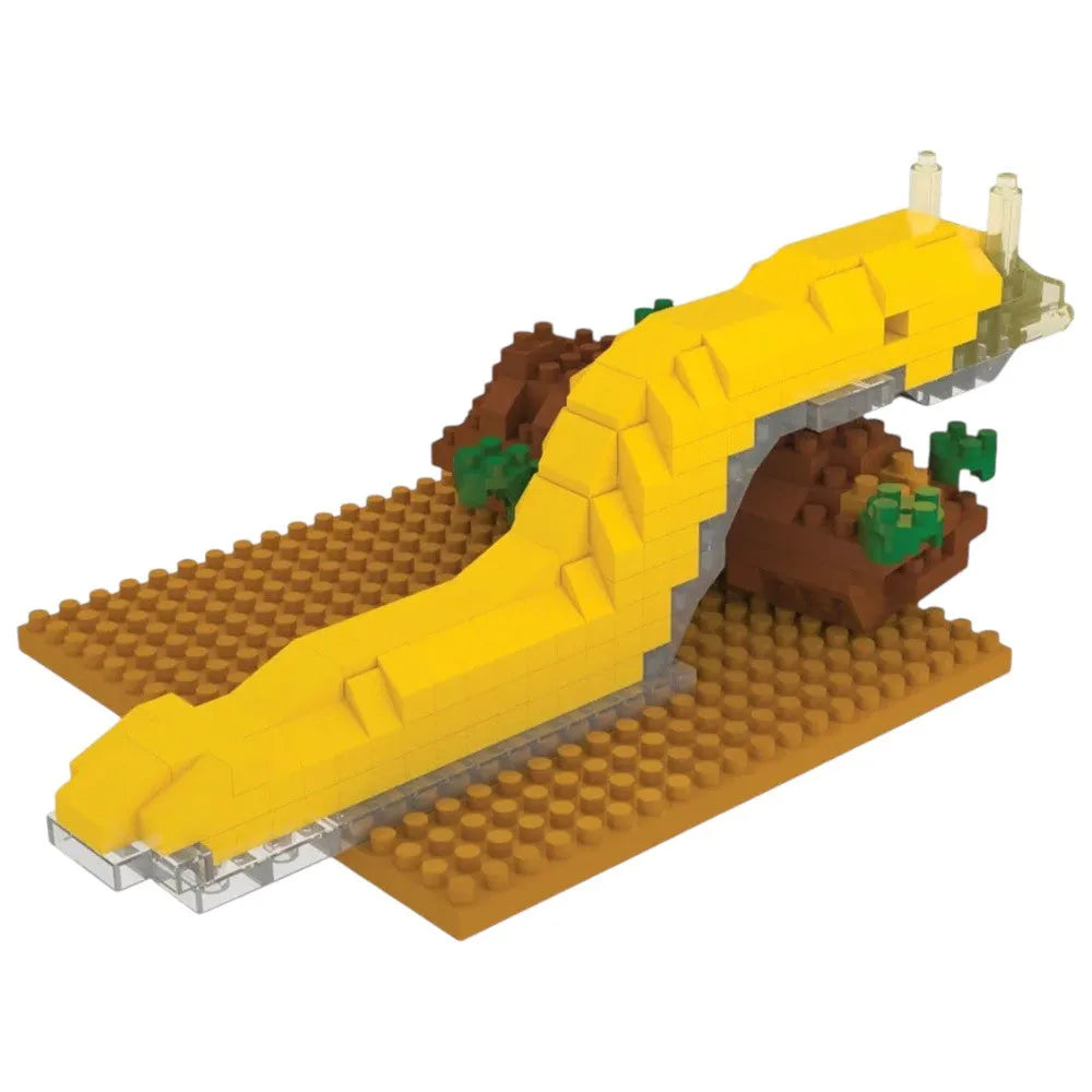 Toy banana slug made of interlocking bricks on a white background