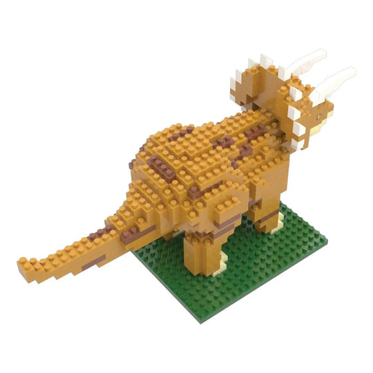 Mini building blocks set of a triceratops dinosaur on a green base.
