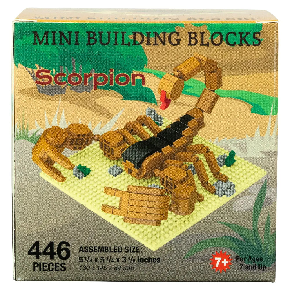 Box of mini building blocks shaped like a scorpion with desert landscape illustration.