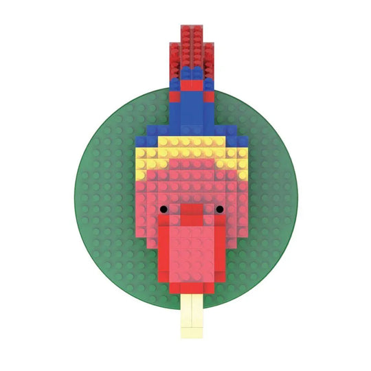Mini building blocks set of a red, yellow, and blue macaw against a white background