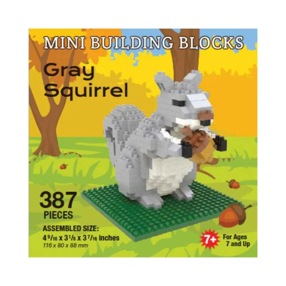 Box of mini building blocks shaped like a gray squirrel with a yellow background