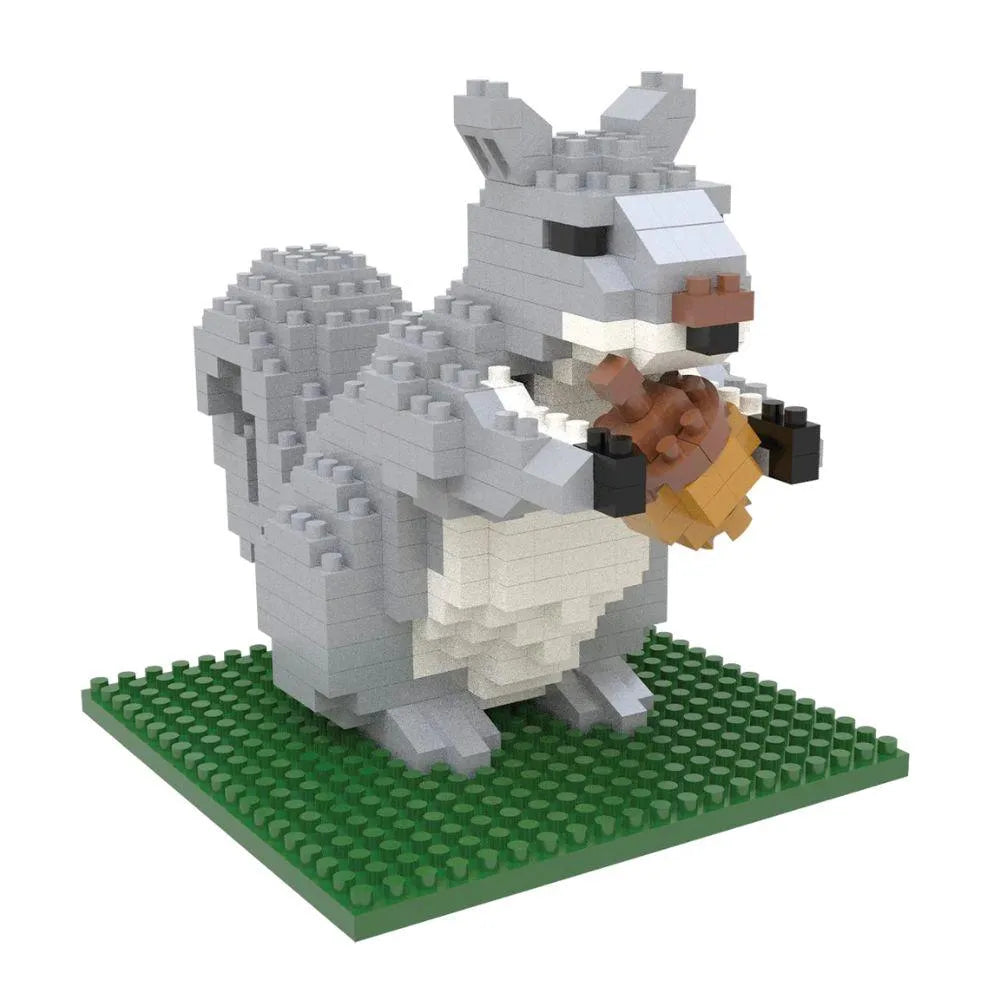Mini block building set of a gray squirrel on a green baseplate with a white background