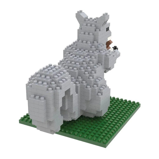 Mini block building set of a gray squirrel on a green baseplate with a white background