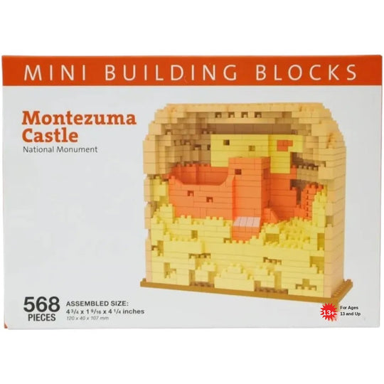 Box packaging for a Mini Building Blocks set featuring the Montezuma Castle National Monument, with a photo of the assembled brick structure on the front and text indicating 568 pieces.