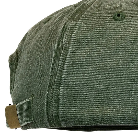Green cotton ball cap side view with buckle detail