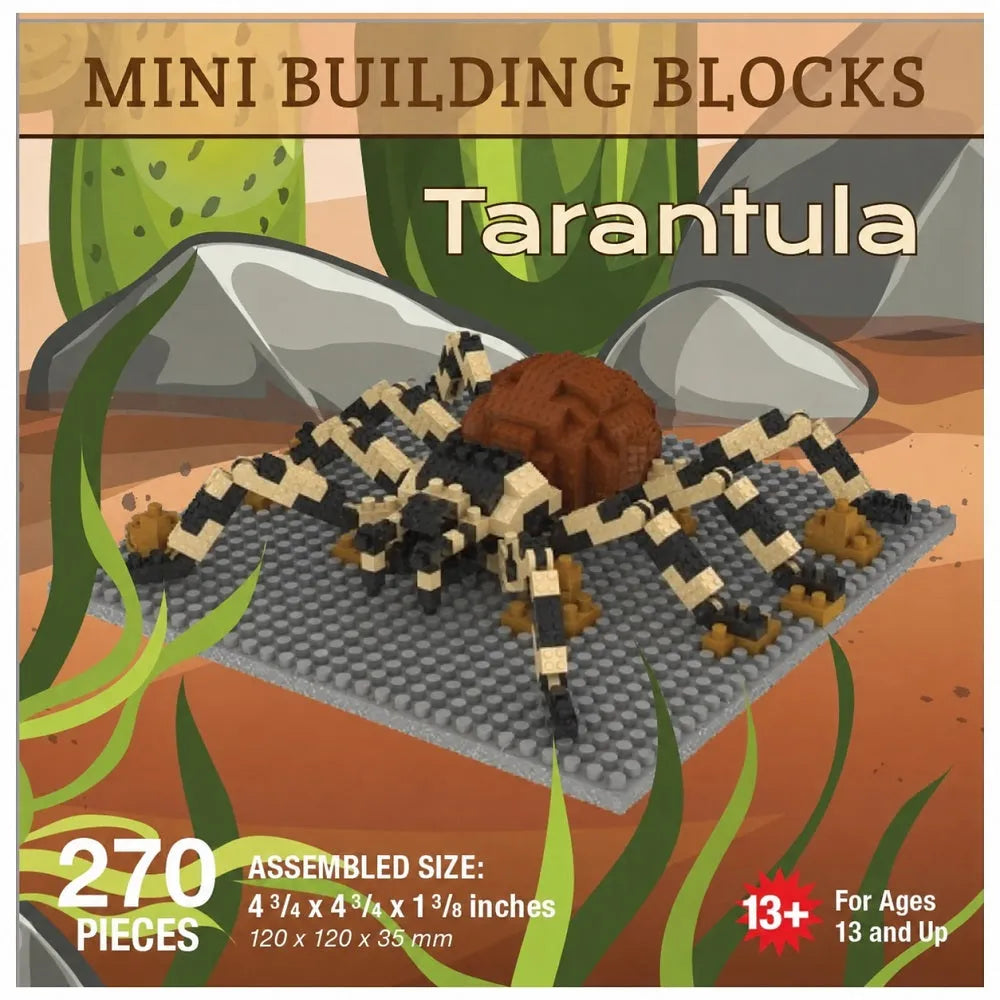 Box-style product graphic for a mini building blocks set named Tarantula, showing an assembled spider-like structure made of black, beige, and brown blocks on a gray base, with cactus and rock graphics in the background. Text includes &