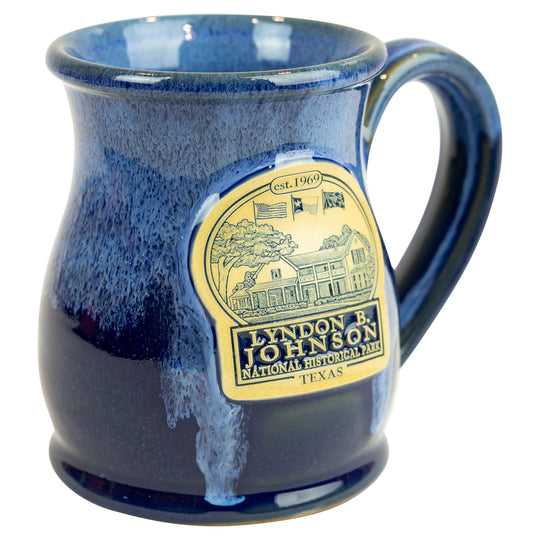 Blue mug with a label featuring 'Lyndon B. Johnson National Historical Park, Texas' on a white background.