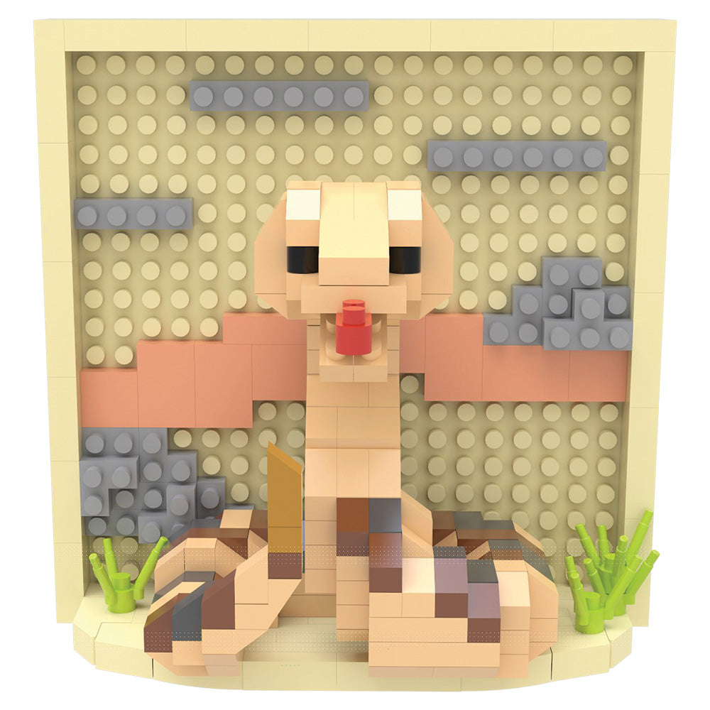 A block-built toy model of a rattlesnake, constructed from interlocking plastic bricks, set against a beige stud-patterned backdrop with gray and peach accents.