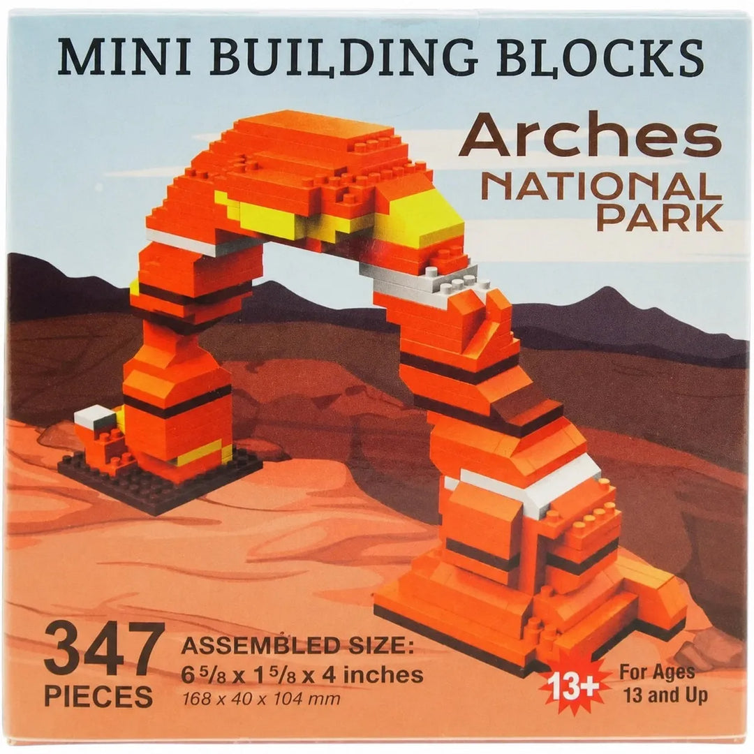 Box front for a mini building blocks set showing an orange and yellow arch structure assembled in the style of LEGO, with desert landscape artwork and text reading 'MINI BUILDING BLOCKS', 'Arches National Park', '347 PIECES', and 'For Ages 13 and Up'.