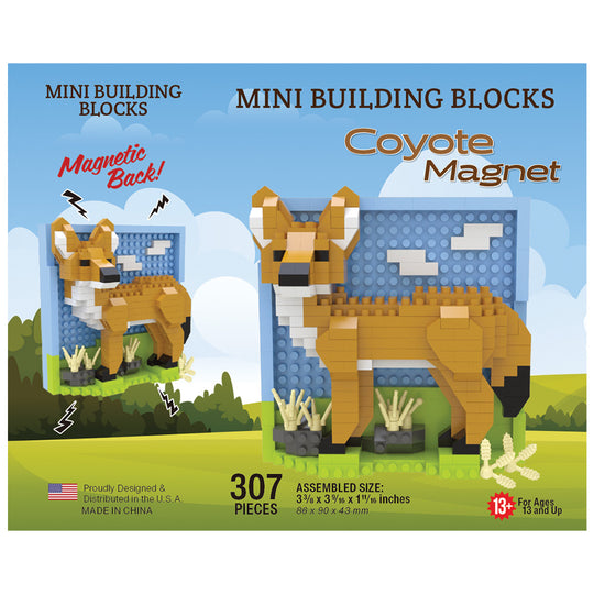 Front of a toy building-block package for Mini Building Blocks Coyote Magnet, showing assembled coyote figures and a blue magnetic backing on a illustrated blue sky and grass background.