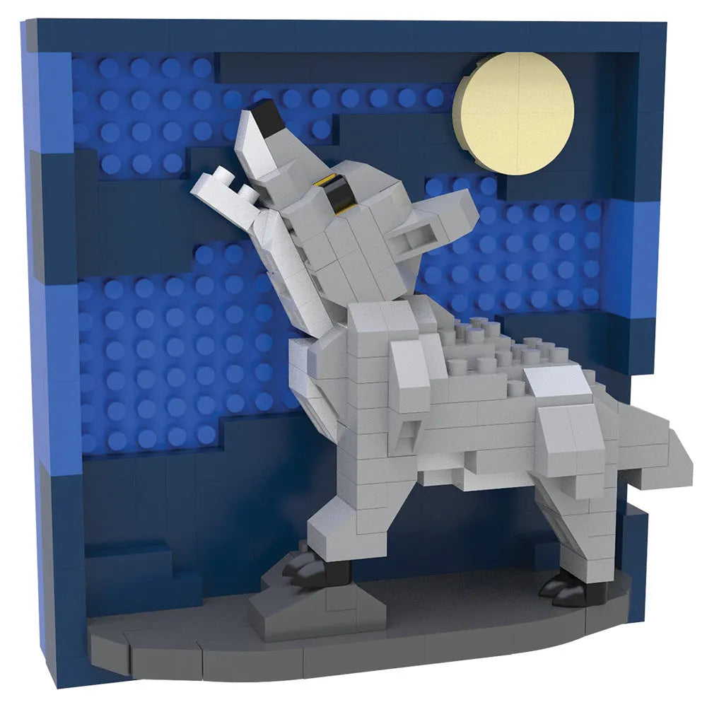 A block-built toy model of a howling wolf standing on a dark gray base, set against a blue brick-patterned backdrop with a pale yellow moon, shown on a plain white background.