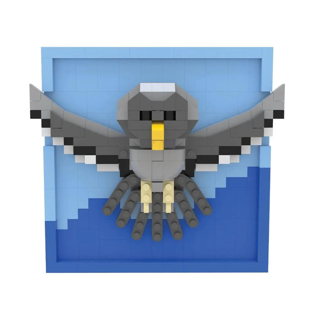 Mini block magnet set of a great horned owl on a white background