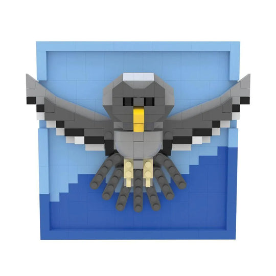 Mini block magnet set of a great horned owl on a white background