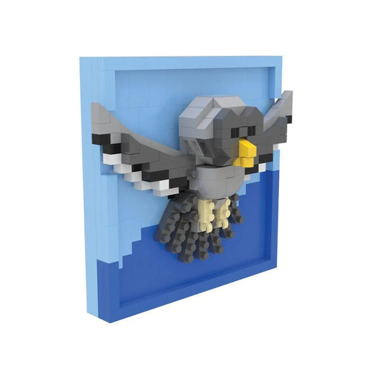 Mini block magnet set of a great horned owl on a white background