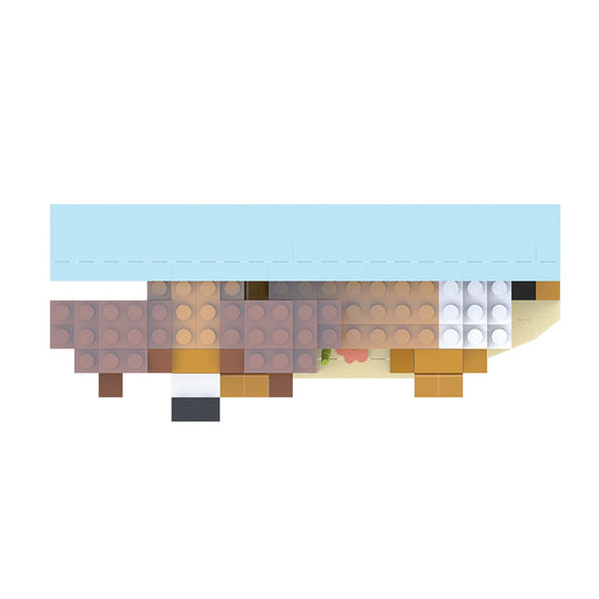 A flat, top-down view of a toy building block structure on a plain white background. The model appears to be a stylized animal or creature made from multiple interlocking blocks, with a light blue top section, tan and brown body sections, white and gray details, and small orange and green accents.