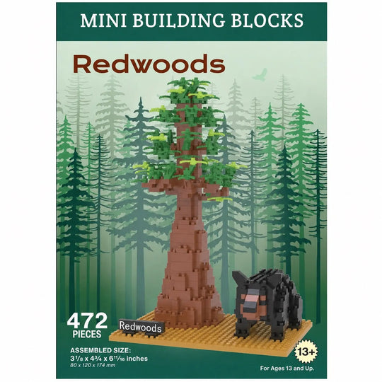 Front of a Mini Building Blocks Redwoods product box showing a assembled redwood tree and a small black animal on a forest background, with text including &