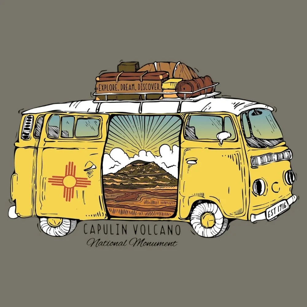 Yellow van with luggage on top, featuring a mountain scene and 'Capulin Volcano National Monument' text.