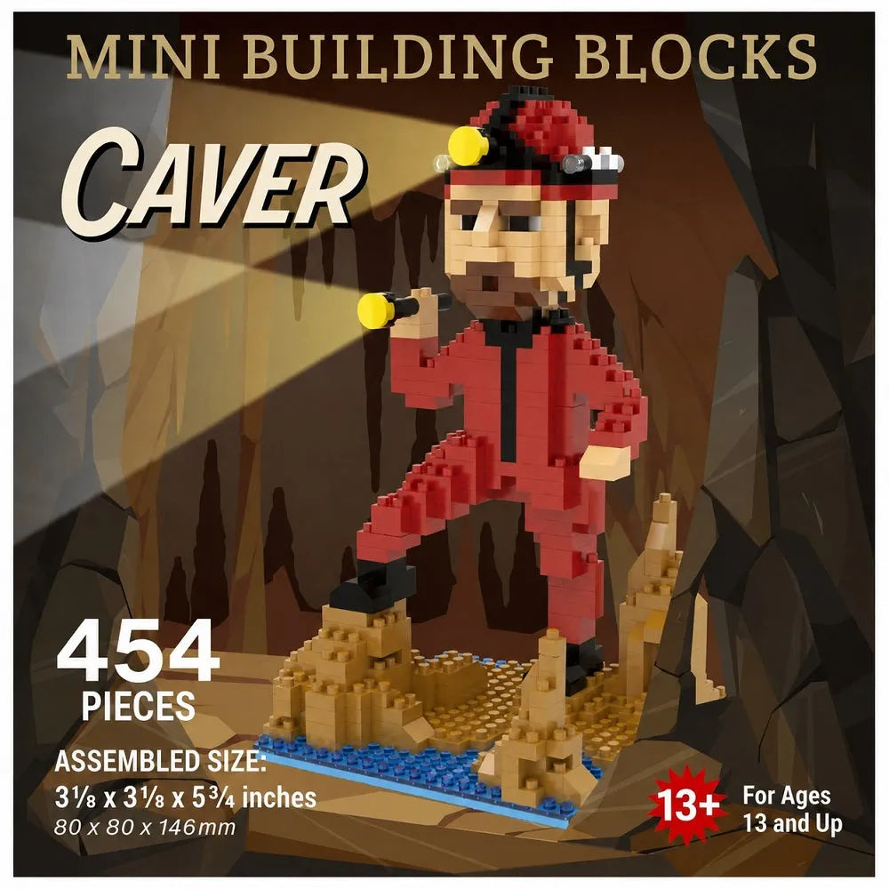 Packaging for a mini building blocks set featuring a cave explorer figure assembled from red, black, tan, yellow, and blue pieces, standing on a rocky base inside a cave scene. Large text reads &