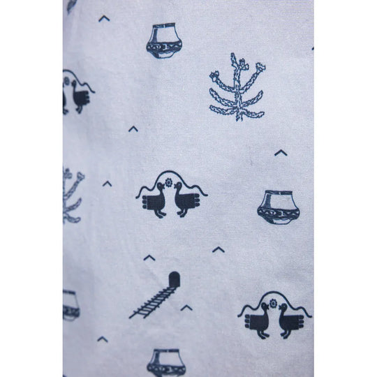 Print detail with pottery, cactus, petroglyph, and ladder to cavate