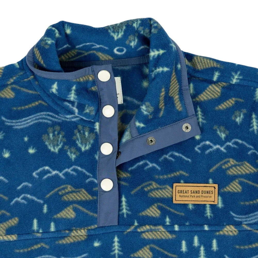 Blue patterned shirt with buttons and a visible Great Sand Dunes National Park & Preserve label on a white background