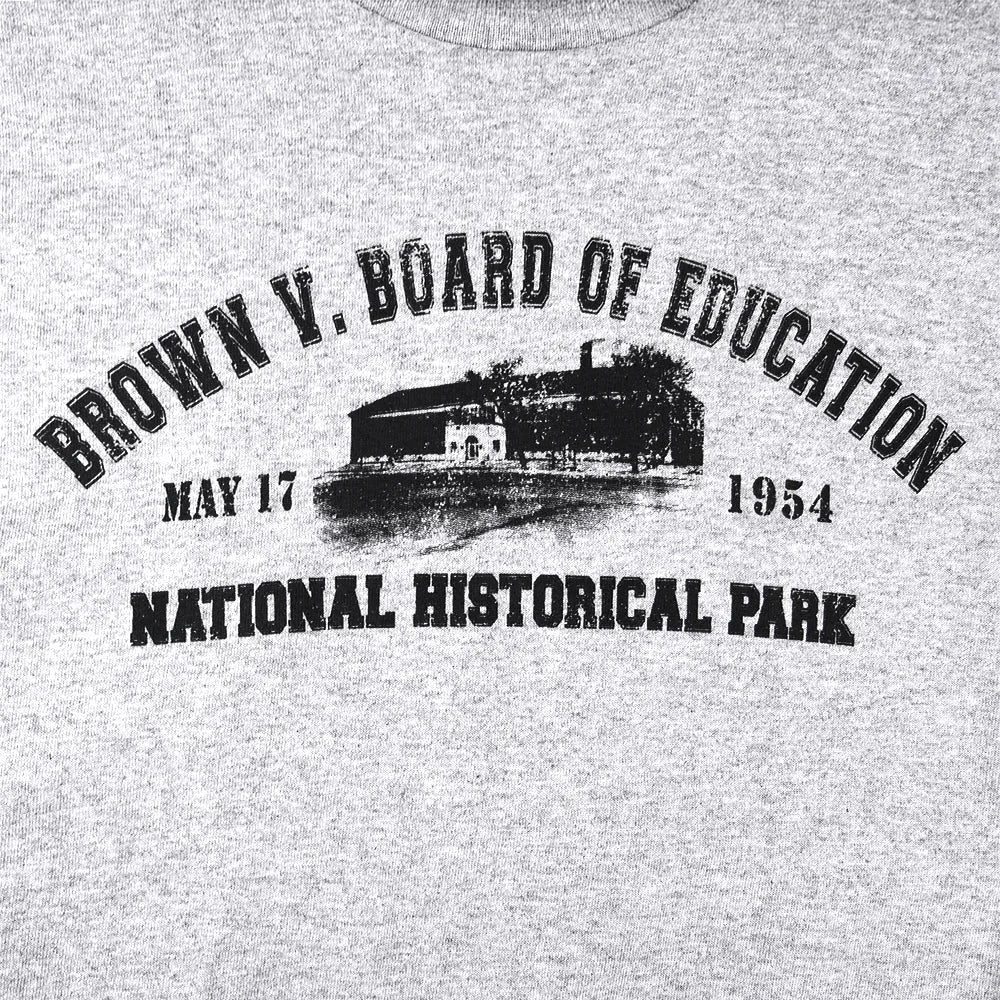 Gray t-shirt with black text and graphic of a building, featuring 'Brown v. Board of Education' and 'National Historical Park'.