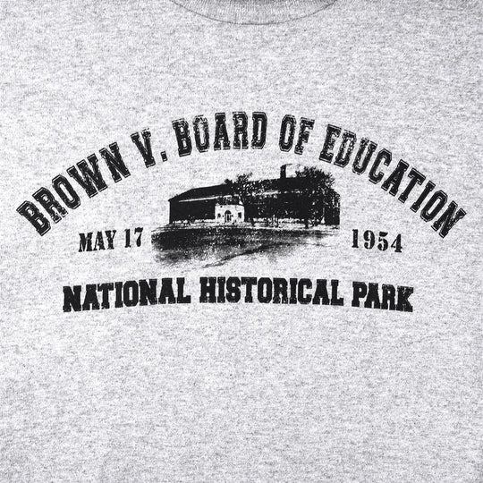 Gray t-shirt with black text and graphic of a building, featuring 'Brown v. Board of Education' and 'National Historical Park'.