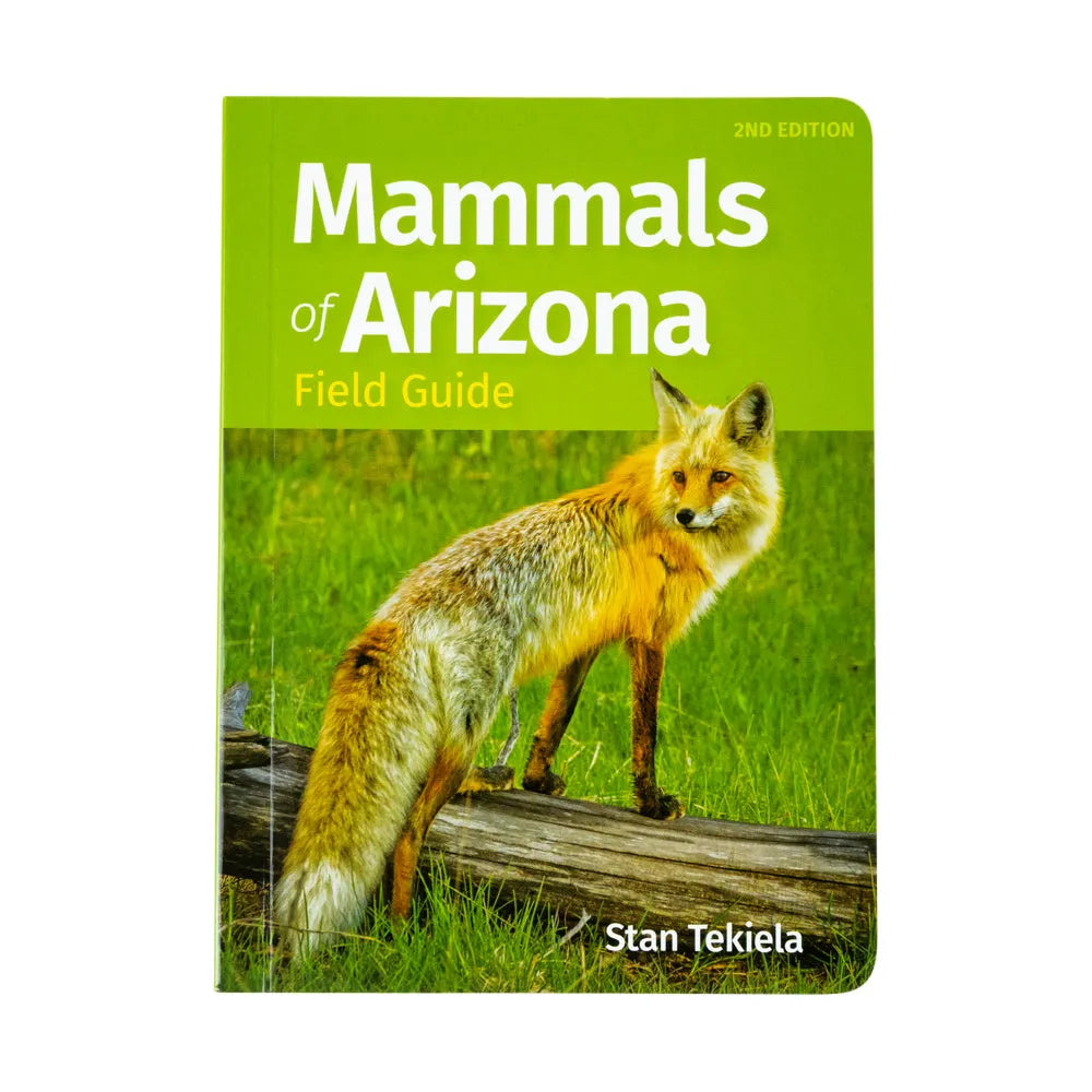 Mammals of Arizona Field Guide 2nd Edition book by Stan Tekiela, featuring a bright green cover with a photo of a red fox standing on a log in a grassy field.