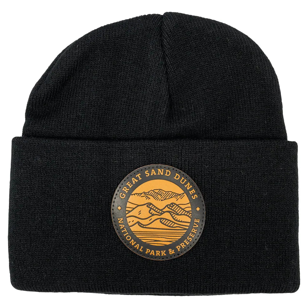 Black knit beanie with leather patch featuring Great Sand Dunes National Park & Preserve