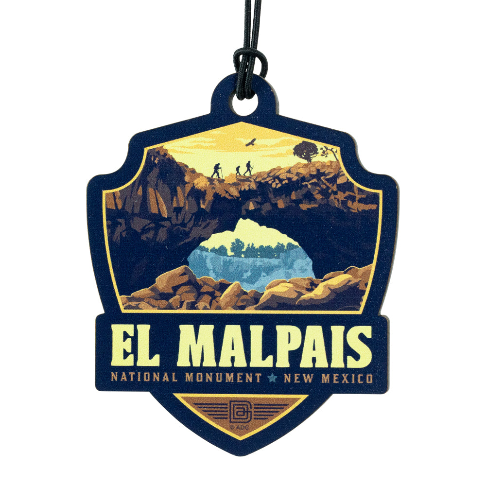 Lanyard badge with El Malpais National Monument design on a white background
