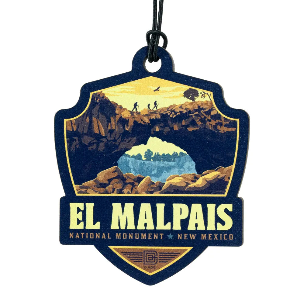 Lanyard badge with El Malpais National Monument design on a white background