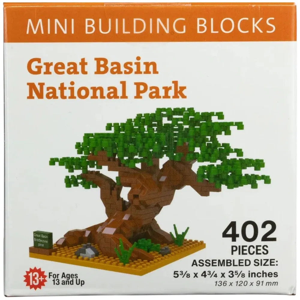 Box of mini building blocks themed around Great Basin National Park with a tree model on it.