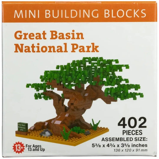Box of mini building blocks themed around Great Basin National Park with a tree model on it.