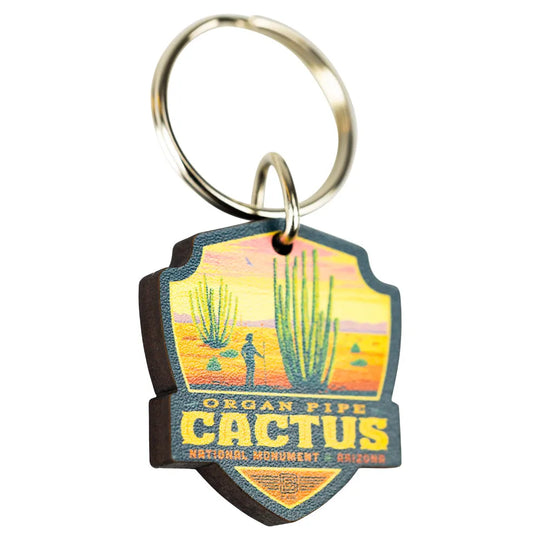 Keychain with desert scene design and 'Organ Pipe Cactus National Monument, Arizona' text on a white background