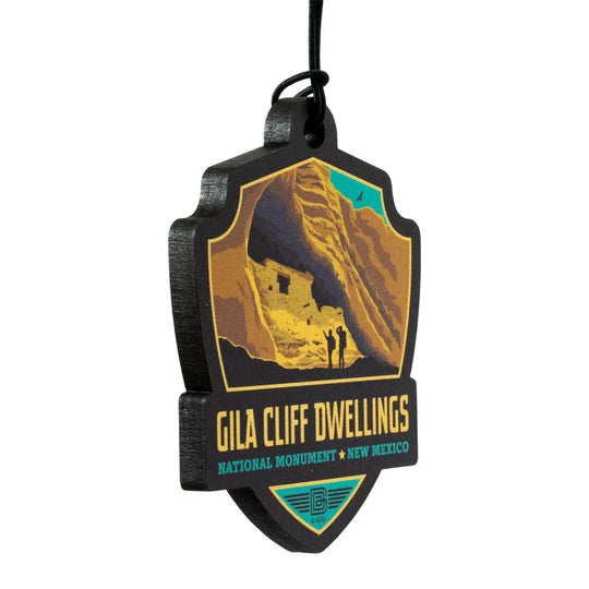 Gila Cliff Dwellings National Monument badge ornament with desert scene and text on a white background