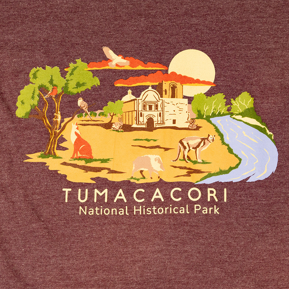 Illustration of Tumacacori National Historical Park with animals and landscape on a maroon T-shirt