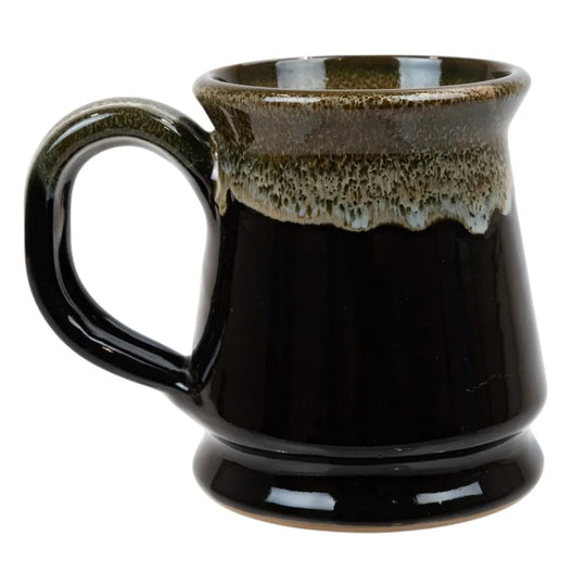 Black ceramic mug with a brown rim on a white background