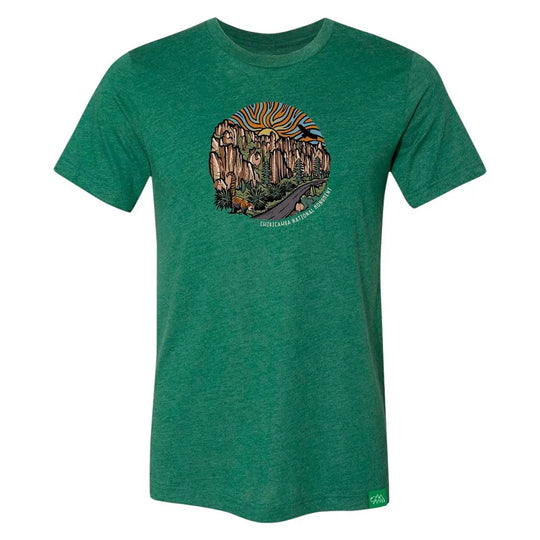 Green t-shirt with a nature graphic on a white background and text 'Chiricahua National Monument'