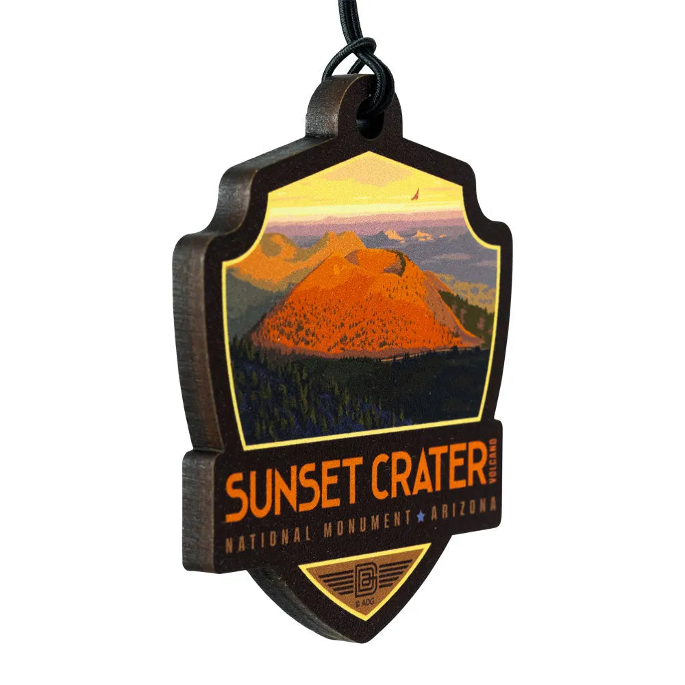 Sunset Crater Volcano National Monument Ornament - ADG Badge Graphic 3/4 view on a white background