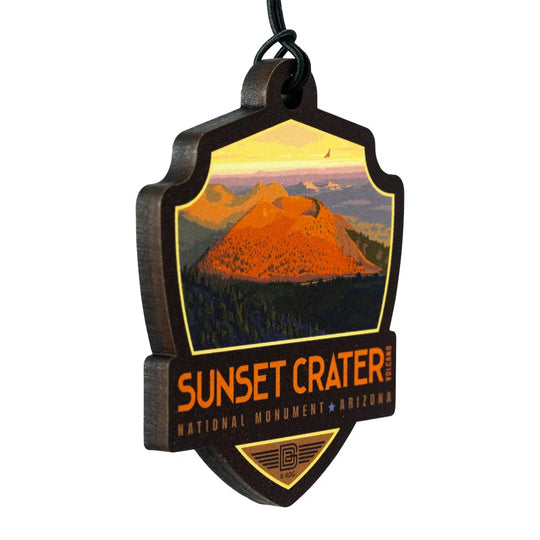 Sunset Crater Volcano National Monument Ornament - ADG Badge Graphic 3/4 view on a white background