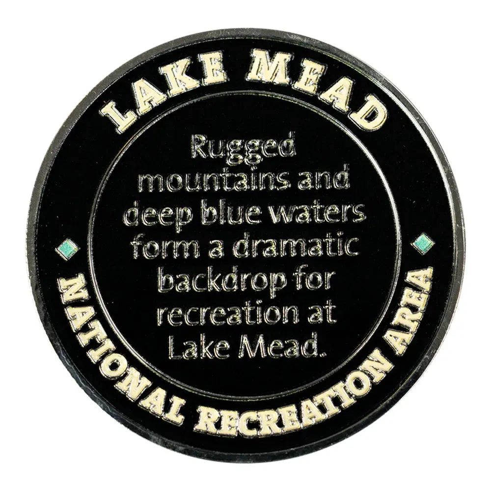 Round black plaque with gold text about Lake Mead National Recreation Area.