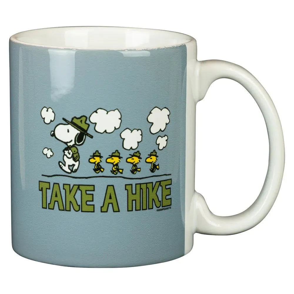 Mug featuring Peanuts characters Snoopy and Woodstock with 'Take a Hike' text in written in green on a light blue background