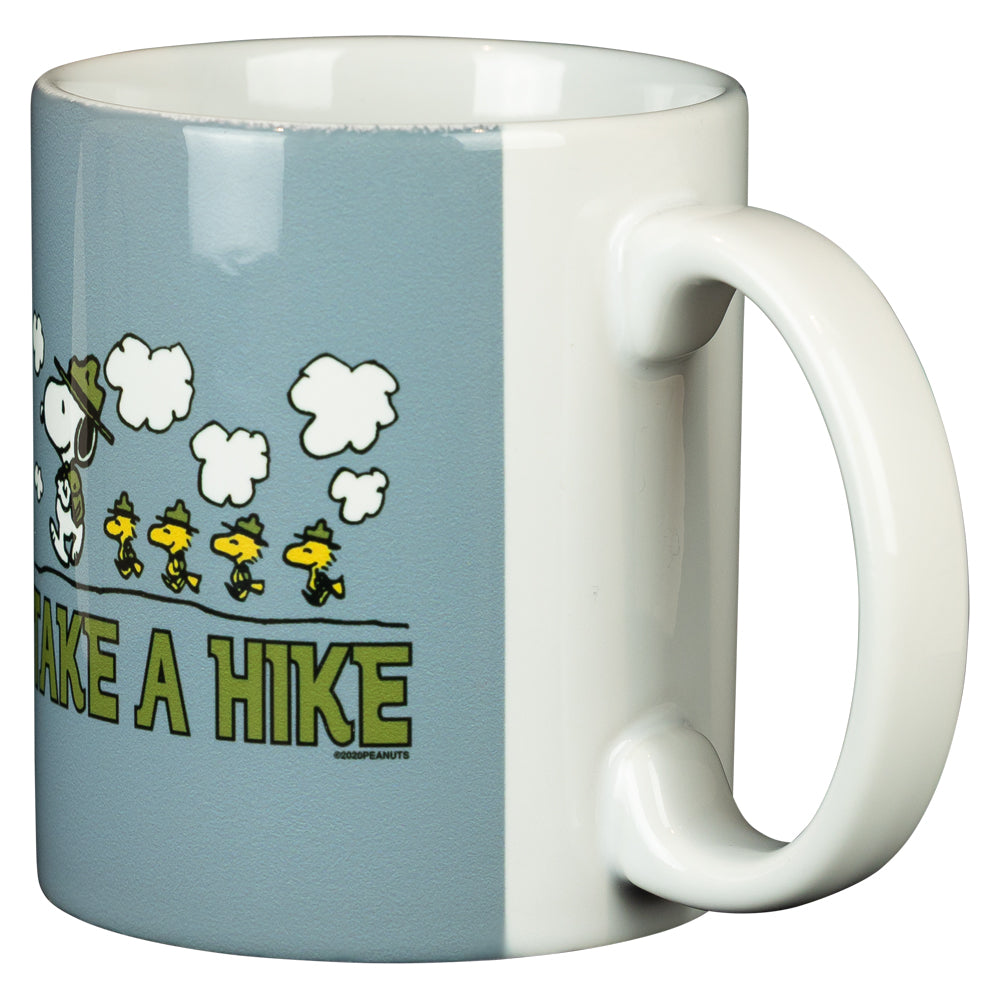 Mug with cartoon design and 'Take a Hike' text on a white background