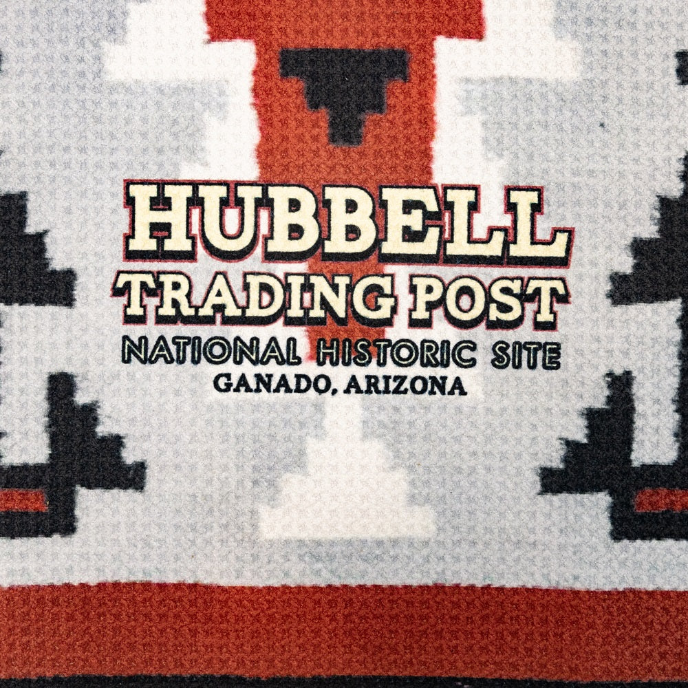 Text on a patterned background for Hubbell Trading Post National Historic Site in Ganado, Arizona.