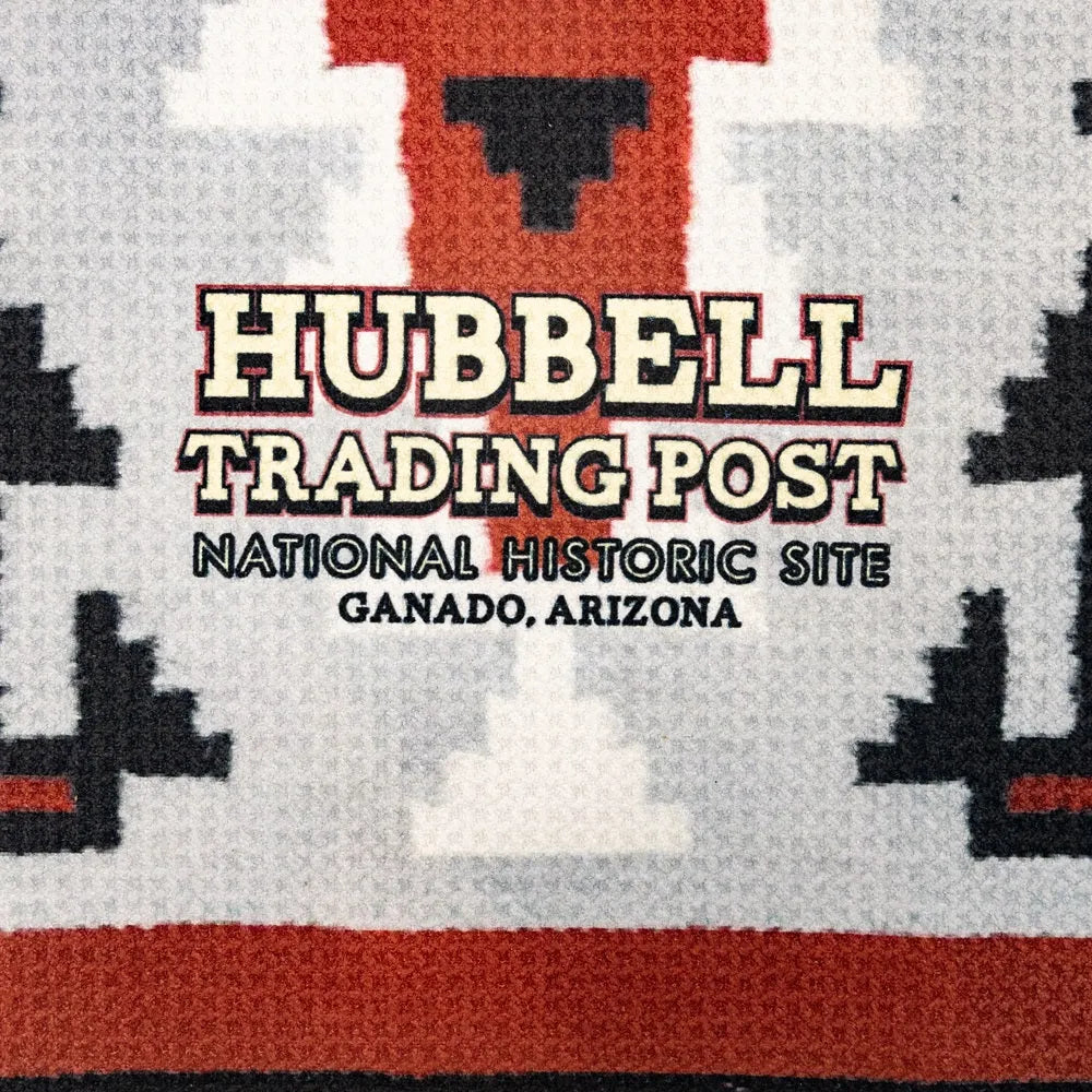 Text on a patterned background for Hubbell Trading Post National Historic Site in Ganado, Arizona.